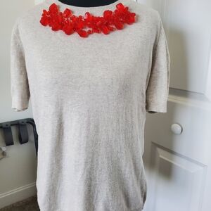 Elegant Beige Top with Red Floral Accent